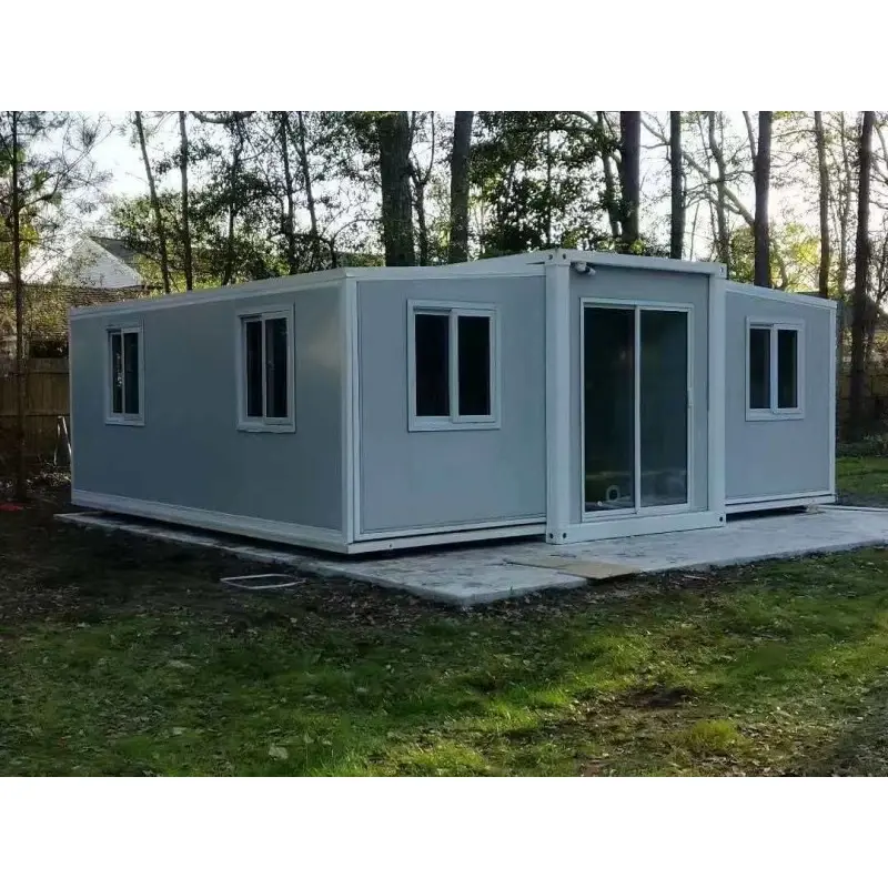 Dviejų sparnų išplečiamas surenkamas namas